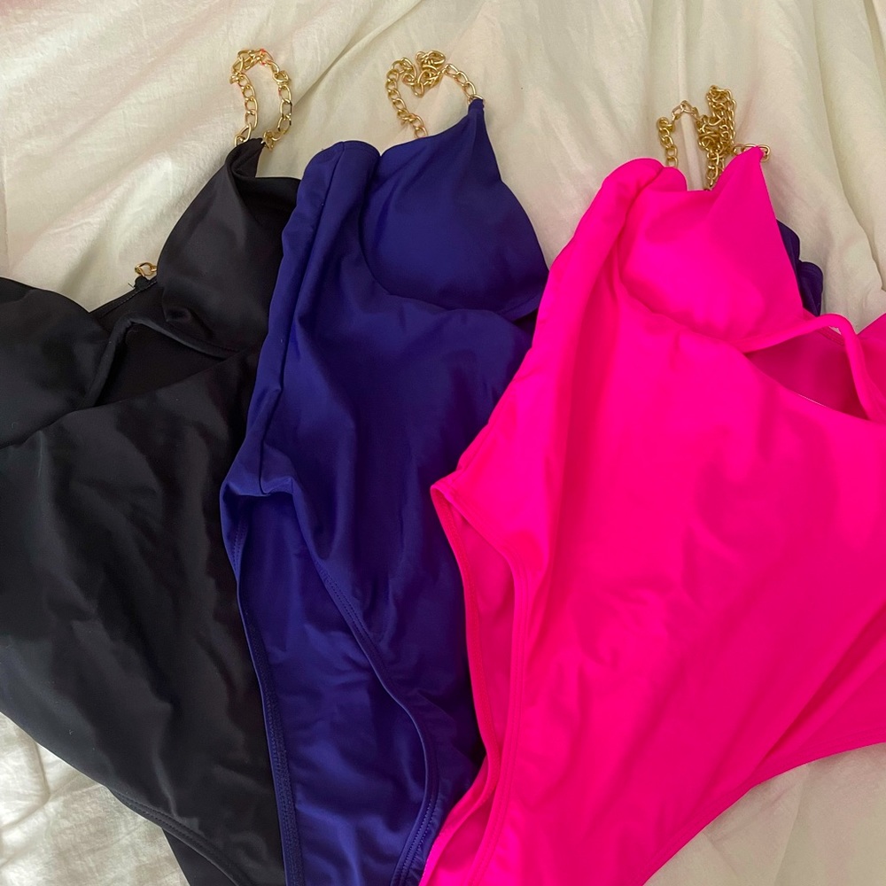 Large bathing suits 3 piece set. Never worn.